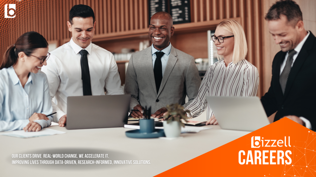 group of business people sitting around a table