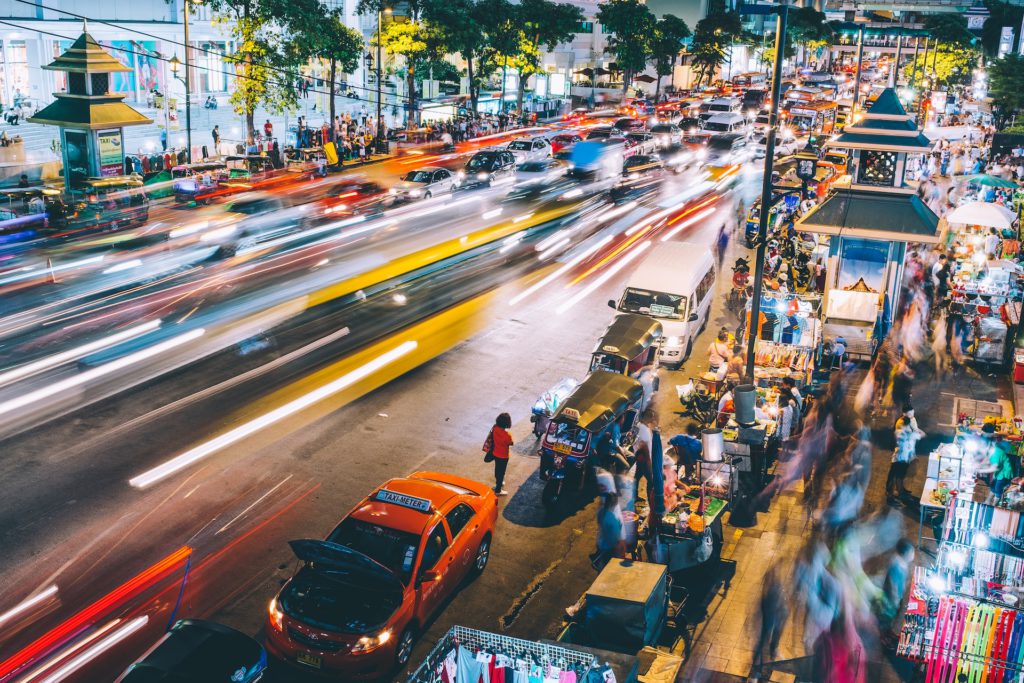 busy city street at night in Bangkok, Thailand